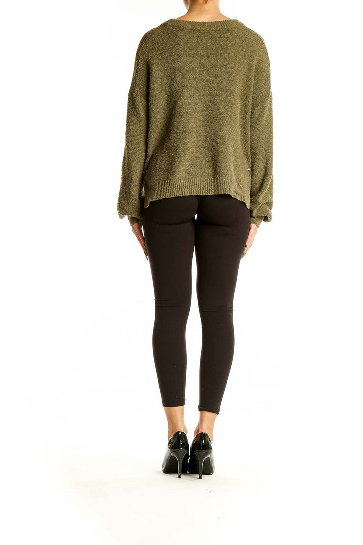 Back view of olive oversized knit sweater showing high-low hemline