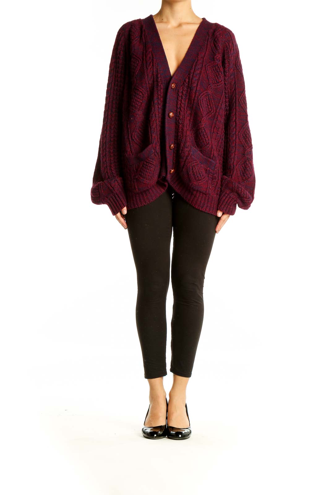 Front view of burgundy oversized cable knit cardigan with V-neck and button closure