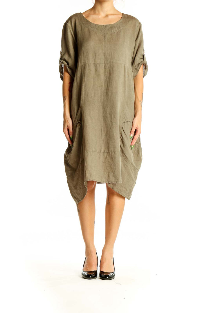 Front view of olive Kaktus linen-cotton dress with relaxed fit and asymmetrical hem