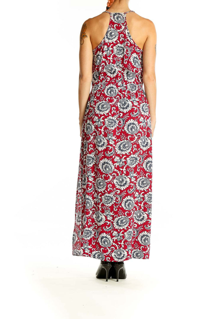 Back view of Gap red floral maxi dress showing cross-back strap design