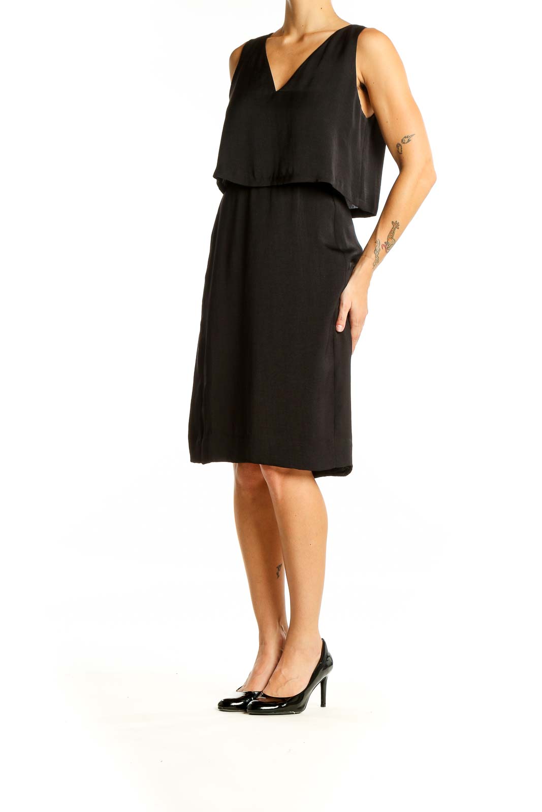 Front view of Madewell black V-neck sleeveless midi dress with overlay bodice