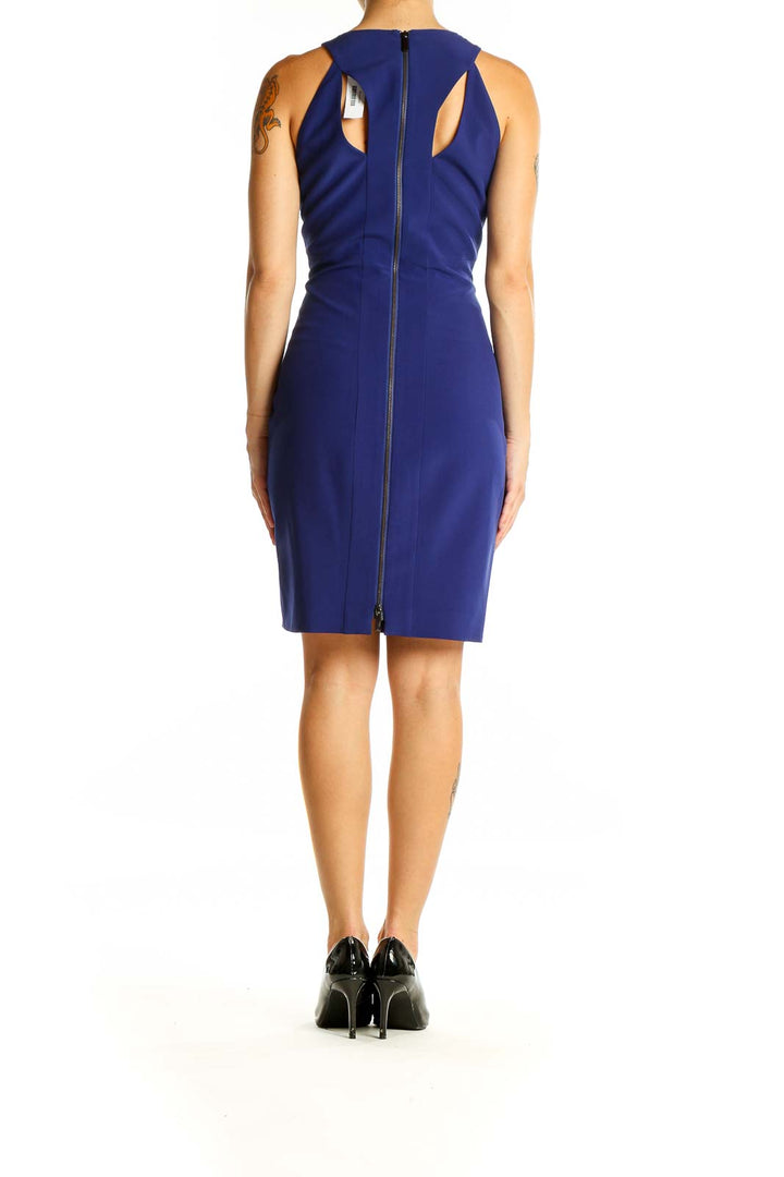 Back view of Karen Millen blue bodycon dress showing zipper and cutout details