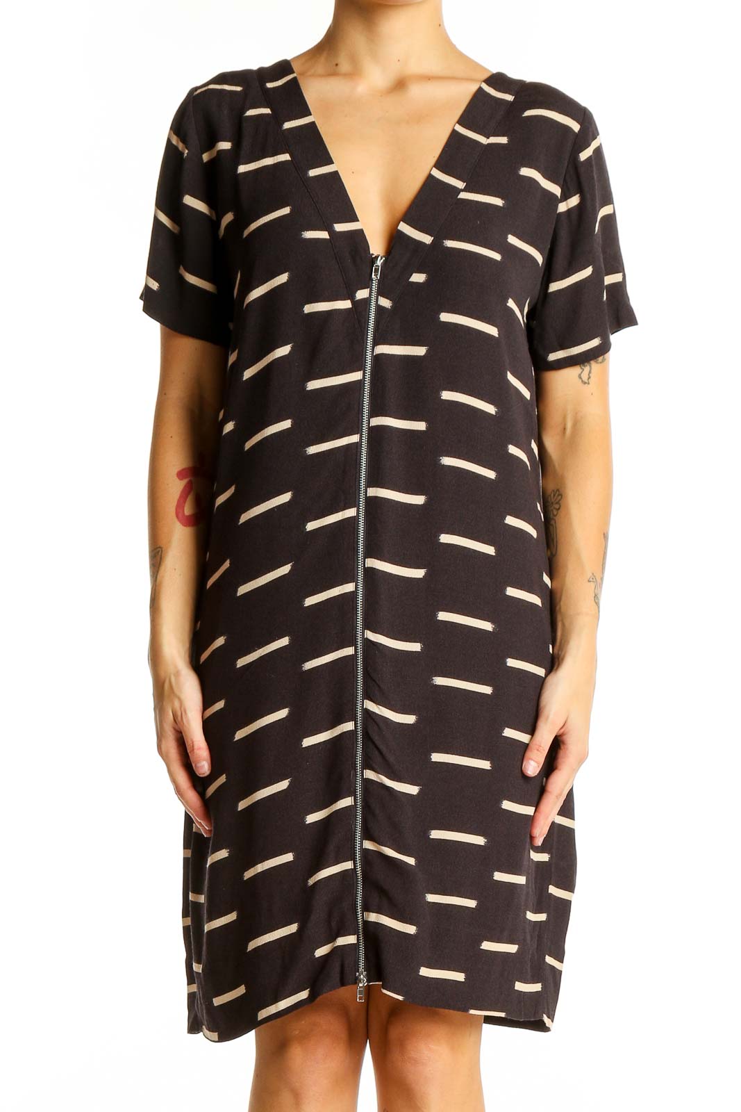 Front view of SilkRoll black striped zip-front shift dress