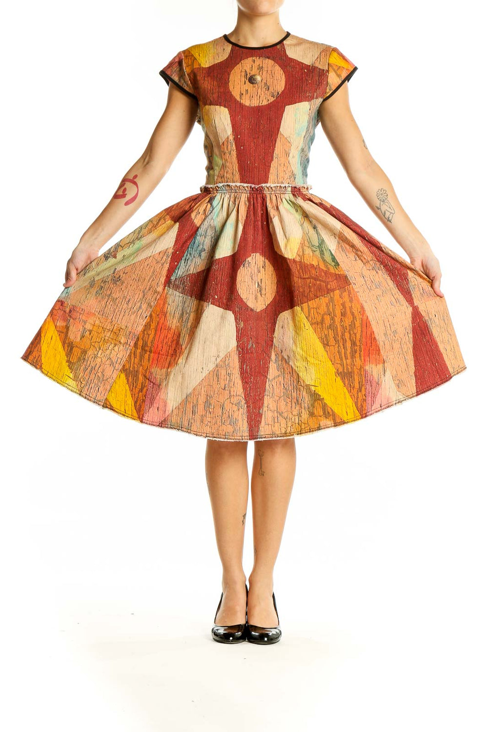 Front view of multicolor geometric print fit-and-flare dress by Making the Cut