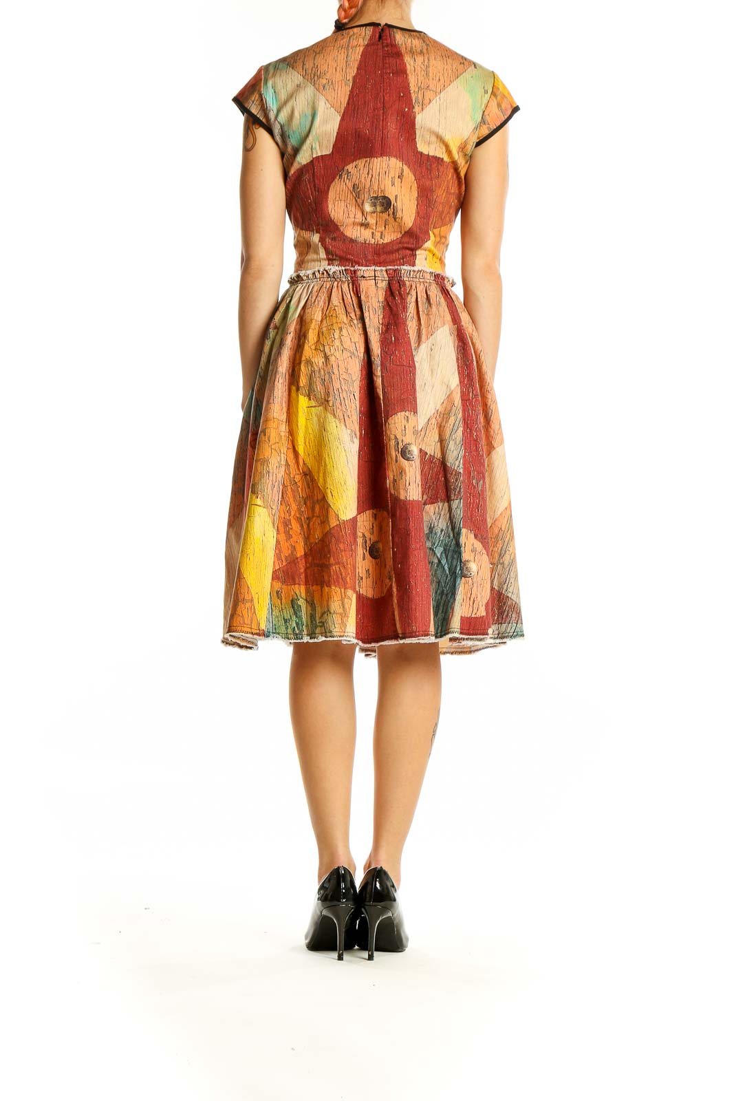 Back view of multicolor geometric print fit-and-flare dress by Making the Cut