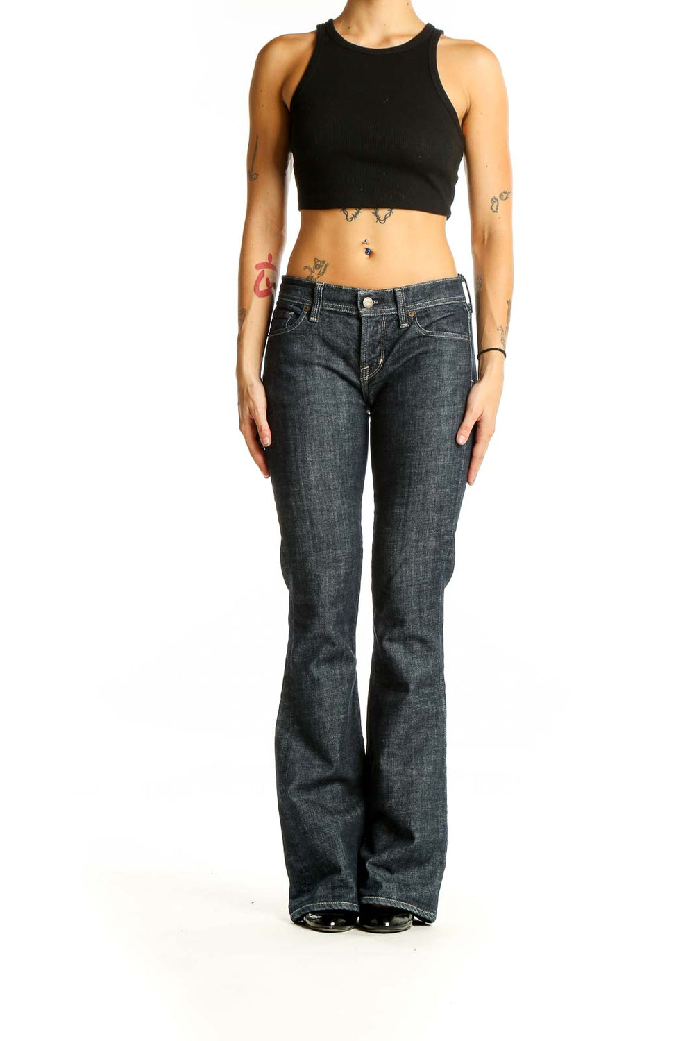 Front view of Citizens of Humanity dark blue flared jeans on model