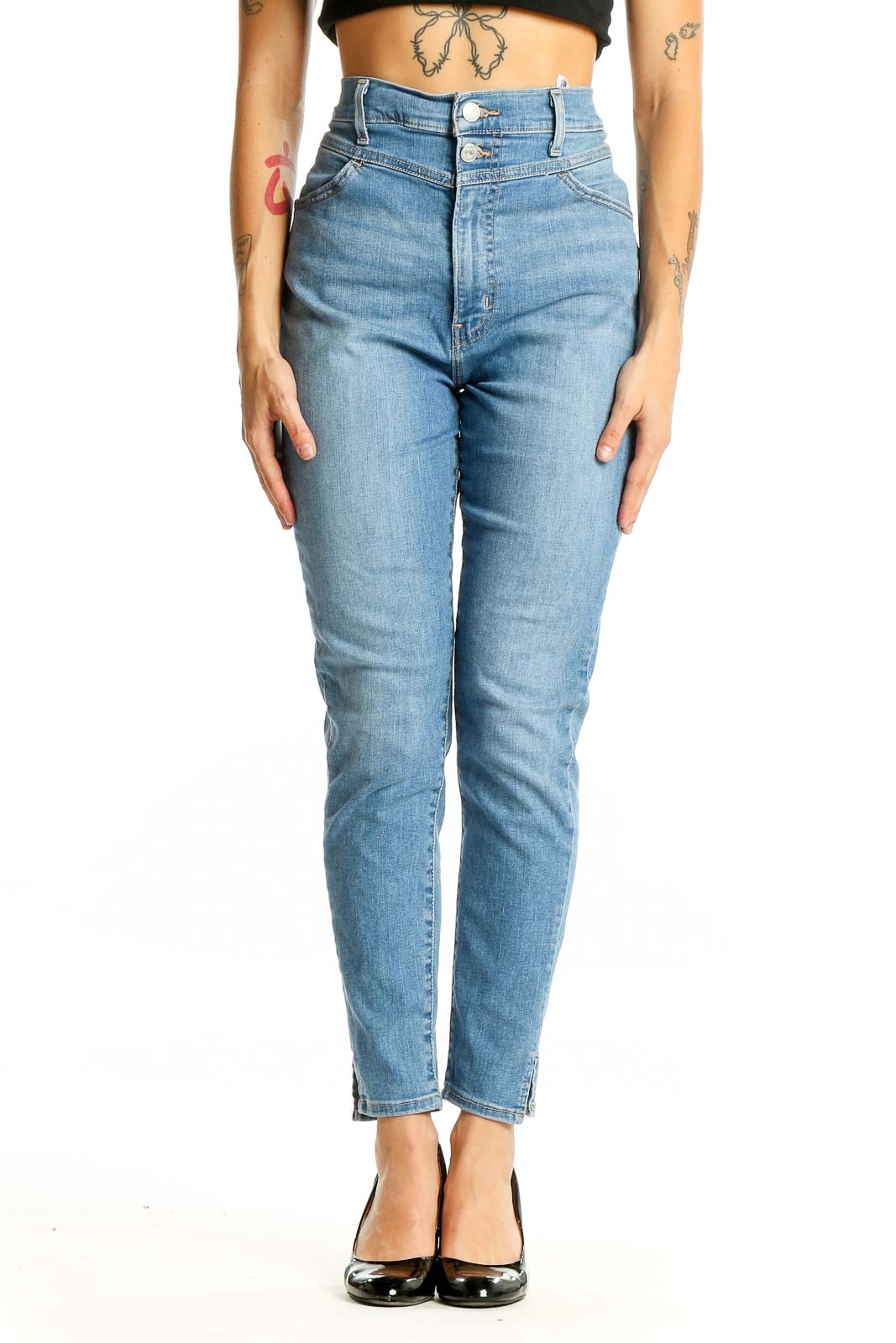 Front view of Levi's light blue high-waisted slim fit jeans on model