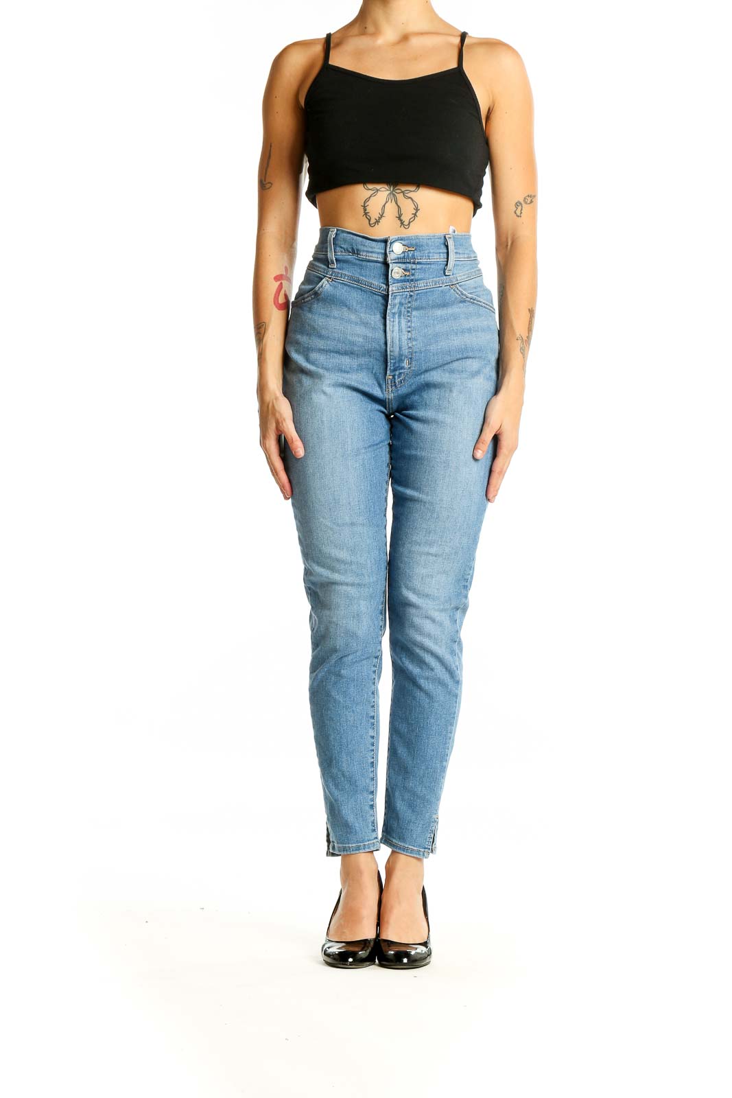 Front view of Levi's light blue high-waisted slim fit jeans on model