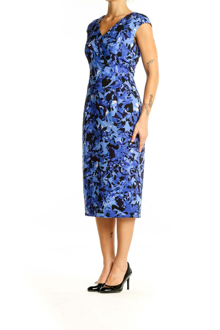 Front view of Maggy London blue floral cap sleeve sheath dress