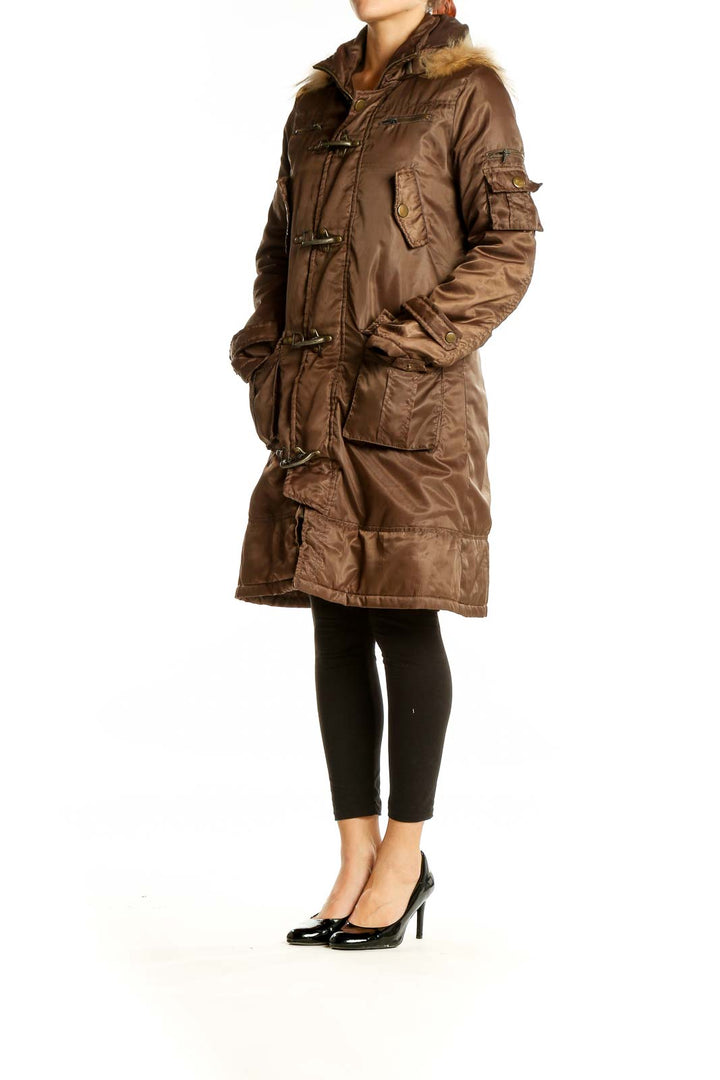 Front view of brown SilkRoll toggle coat with fur-trimmed hood