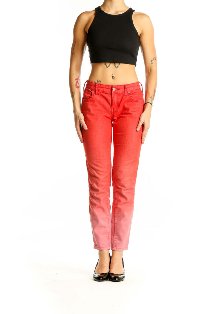 Front view of Free People red ombre skinny jeans with gradient effect