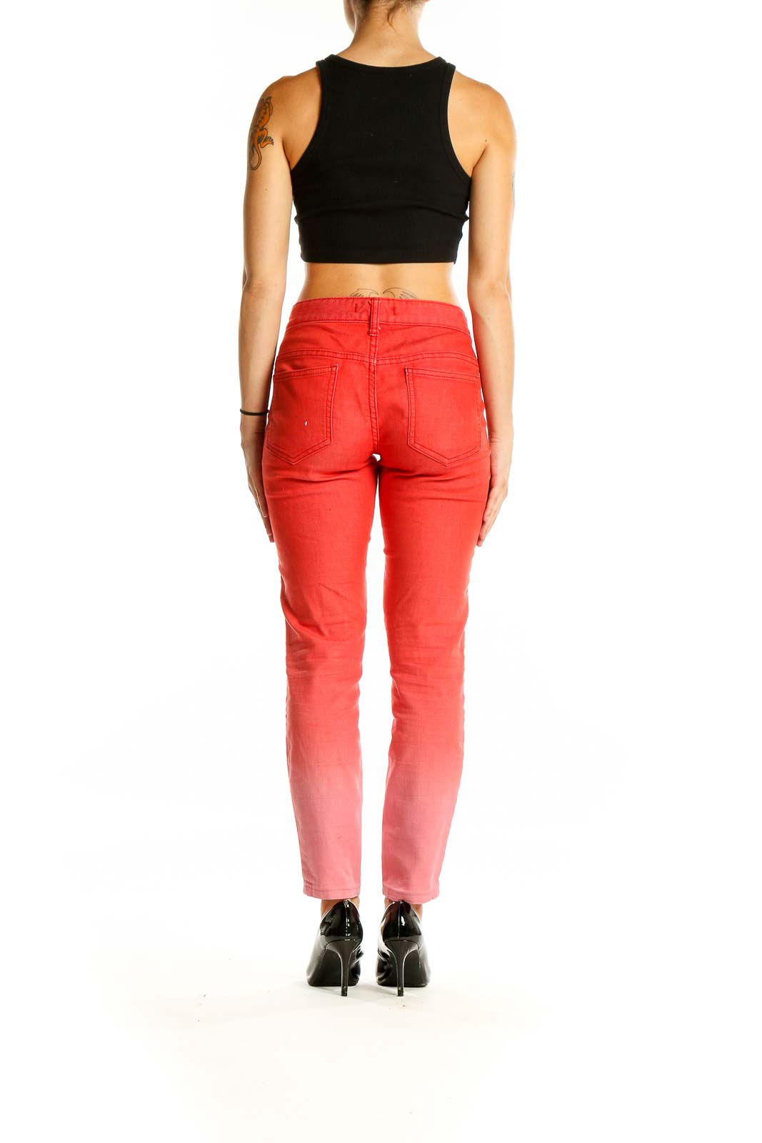 Back view of Free People red ombre skinny jeans showing gradient and fit