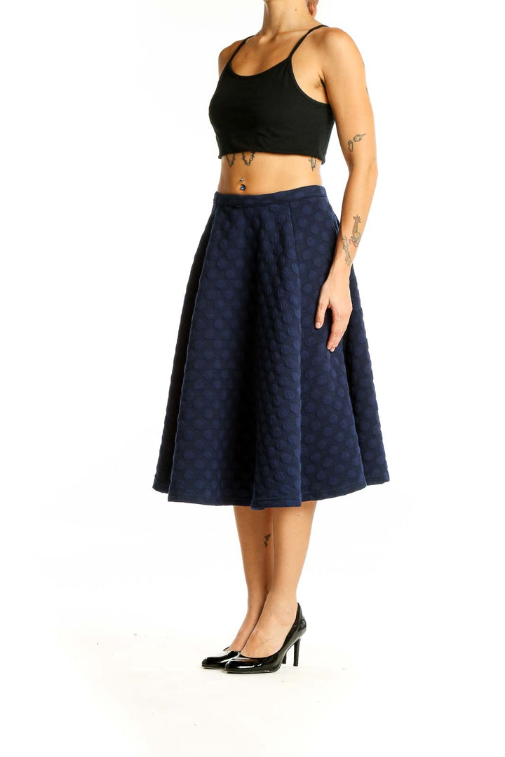 Front view of JOA Los Angeles Navy Polka Dot A-Line Midi Skirt