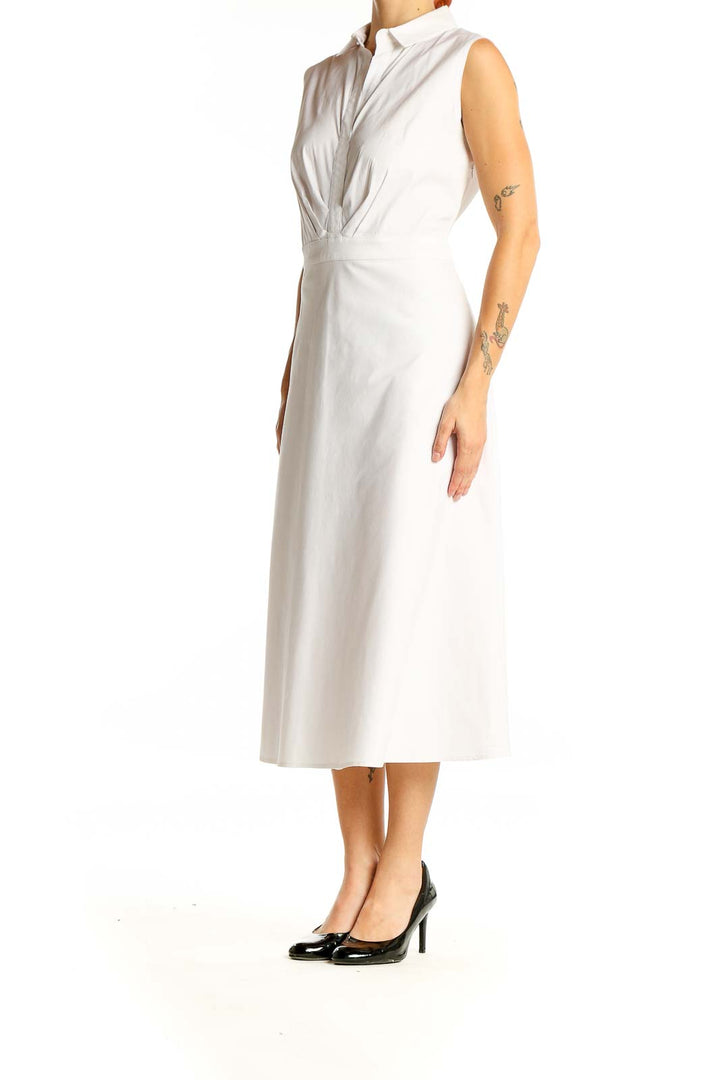 Front view of Lafayette 148 New York white sleeveless midi dress with wrap-style bodice