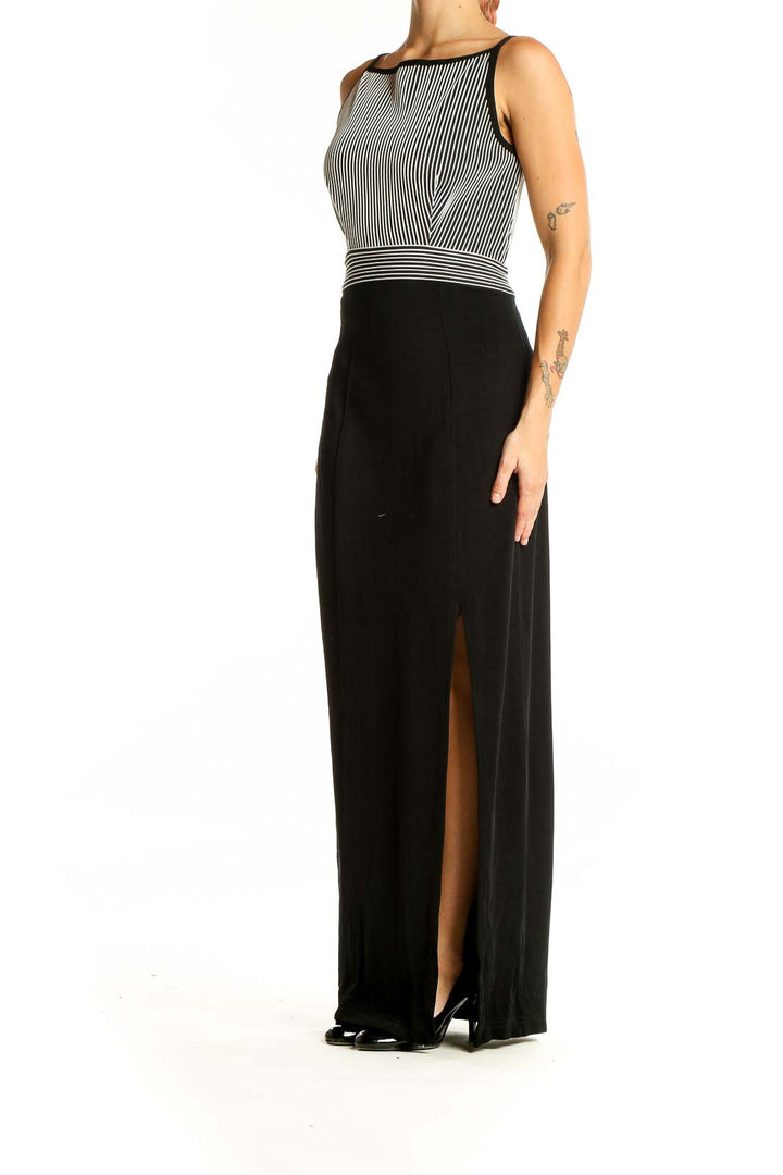 Front view of Tadashi black and white striped maxi dress with fitted bodice