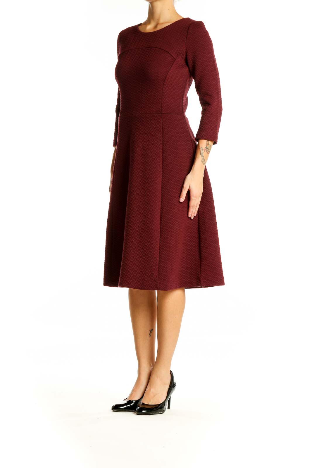 Front view of burgundy Boden fit-and-flare midi dress with textured fabric