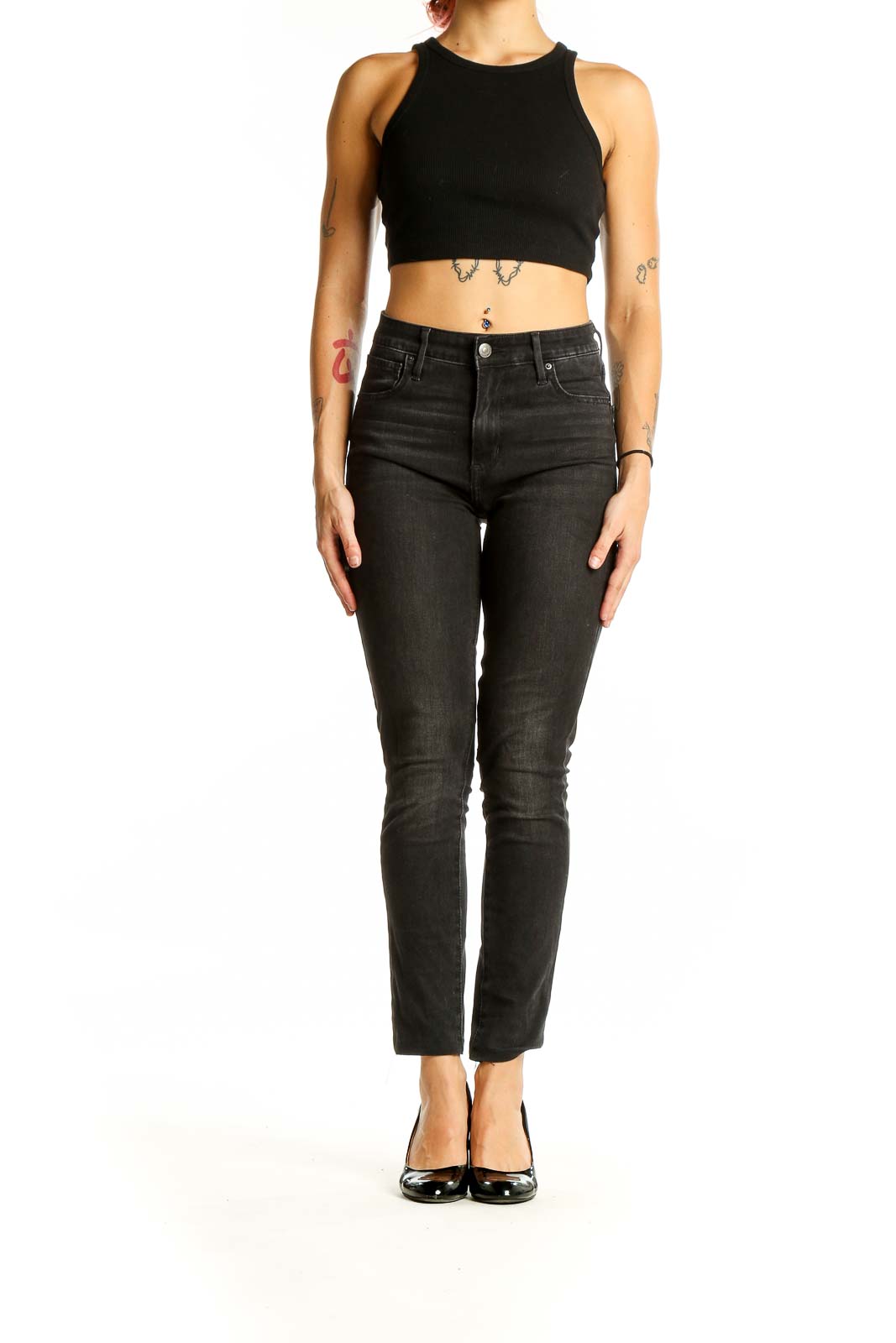 Front view of Levi's black high-waisted slim fit jeans on model