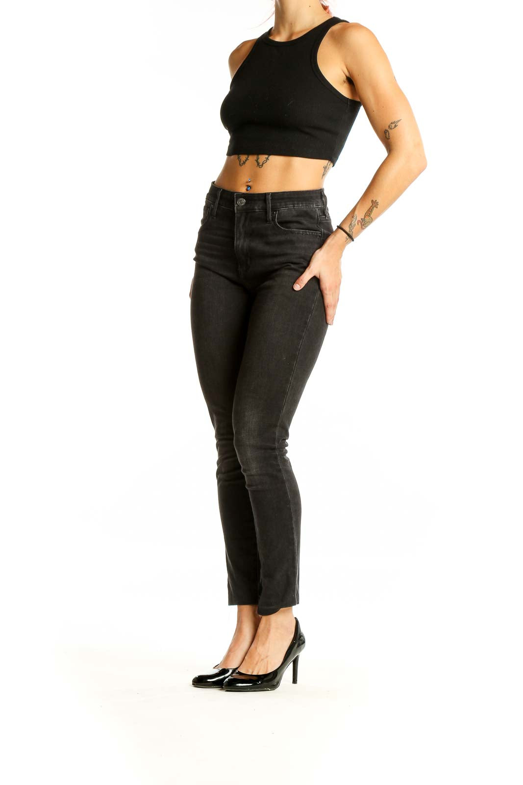 Front view of Levi's black high-waisted slim fit jeans on model