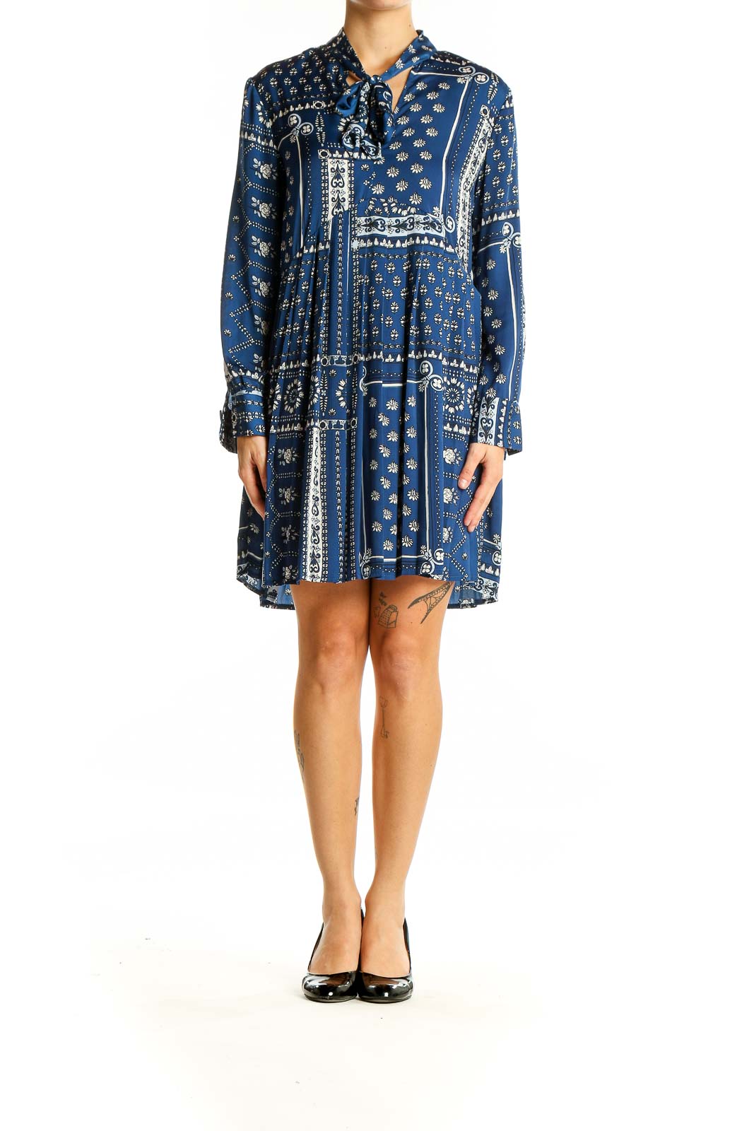 Front view of Zara blue patterned boho-chic mini dress with tie-neck