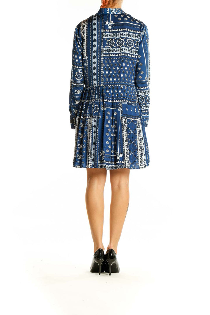 Back view of Zara blue patterned boho-chic mini dress showing tiered skirt