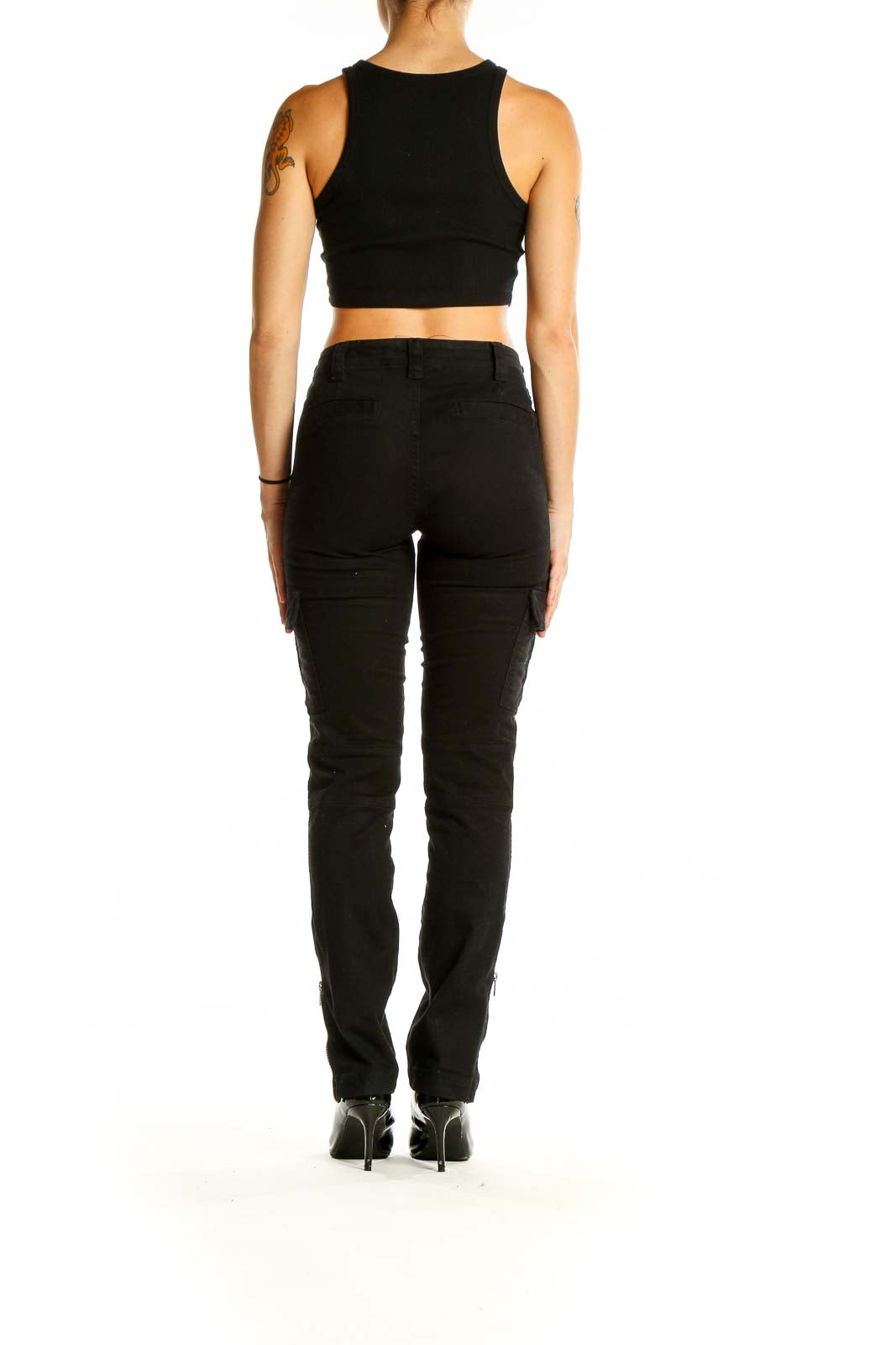 Back view of J Brand black cargo denim jeans on model