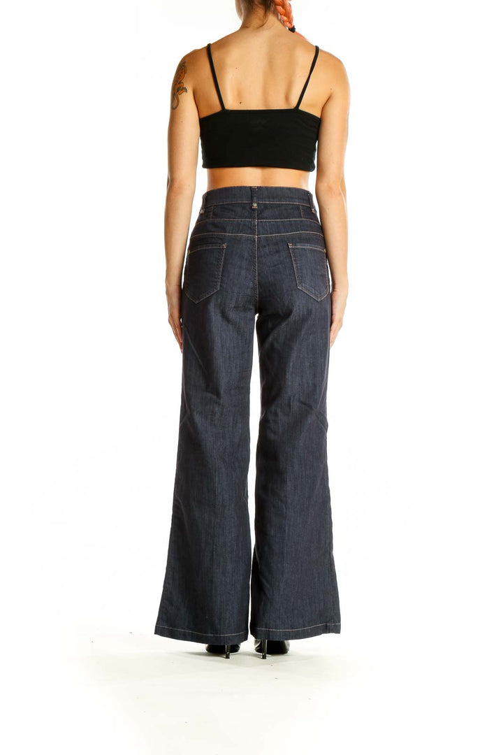 Back view of United Colors of Benetton dark blue wide-leg denim jeans on model