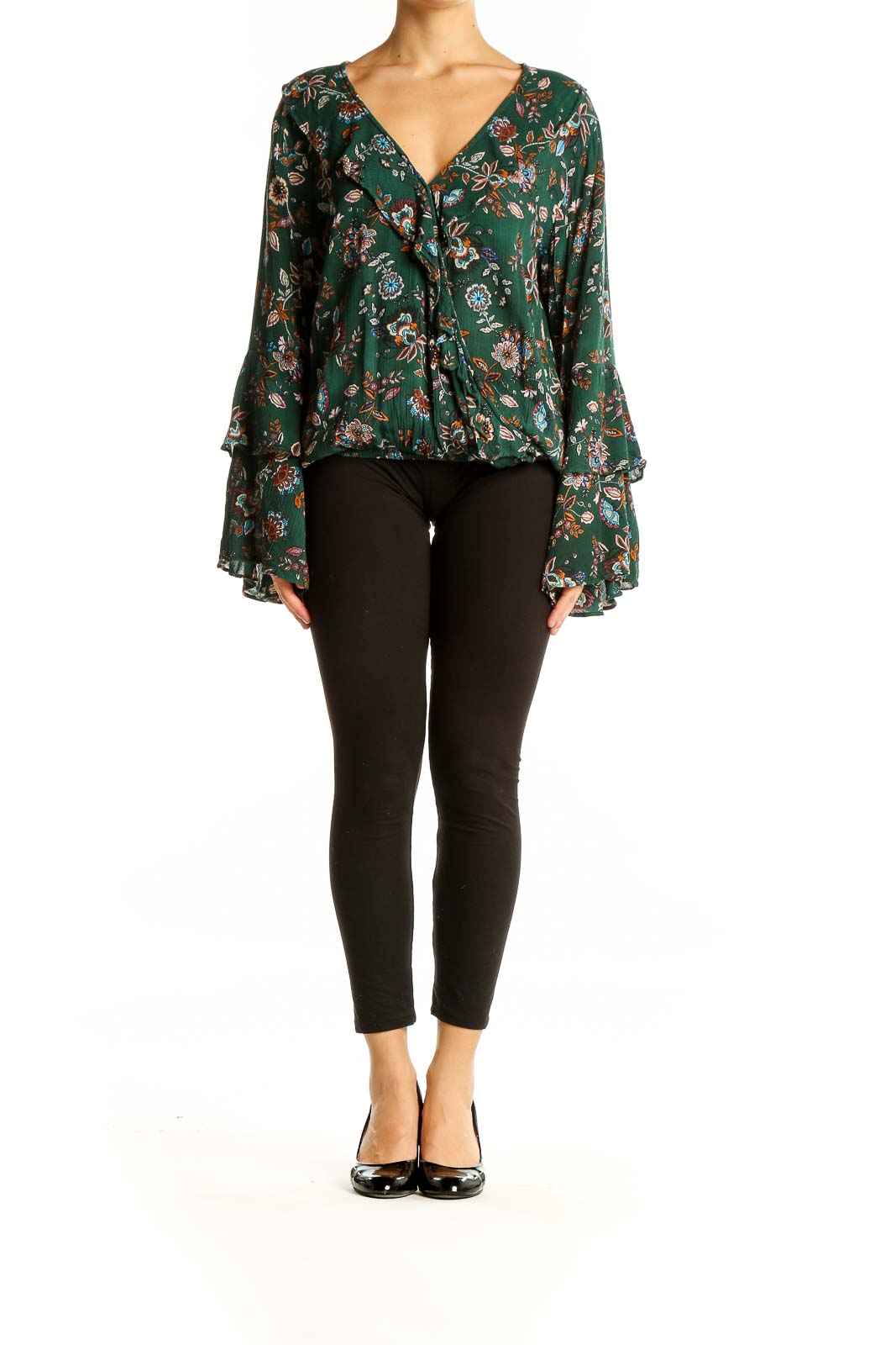 Front view of Chelsea & Violet green floral wrap top with bell sleeves