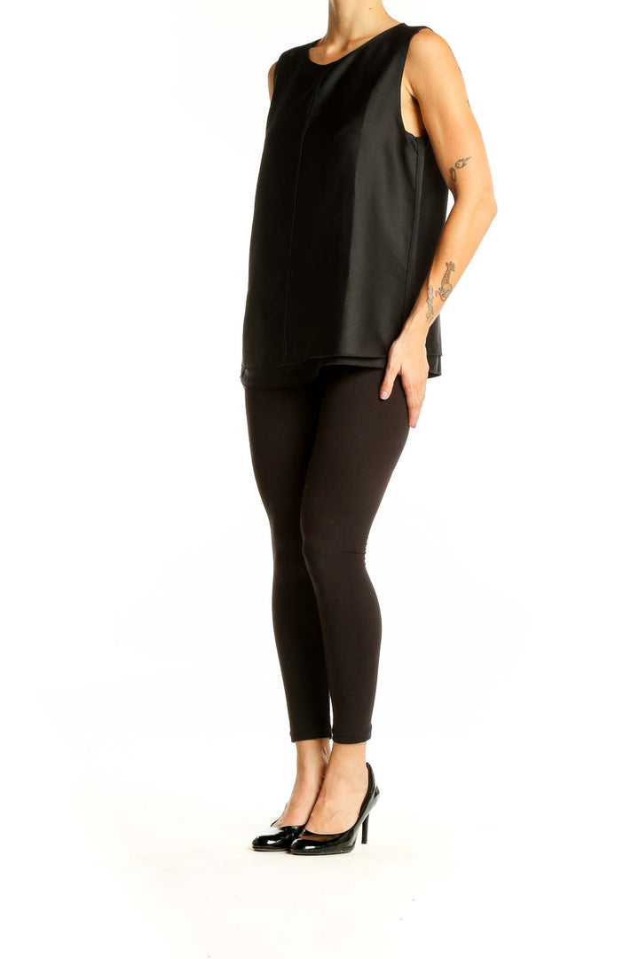 Front view of Zara Basic black sleeveless layered top on model