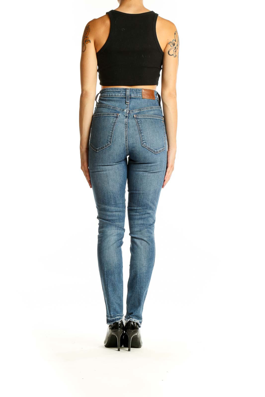 Back view of Madewell blue high-rise skinny jeans showing pocket design