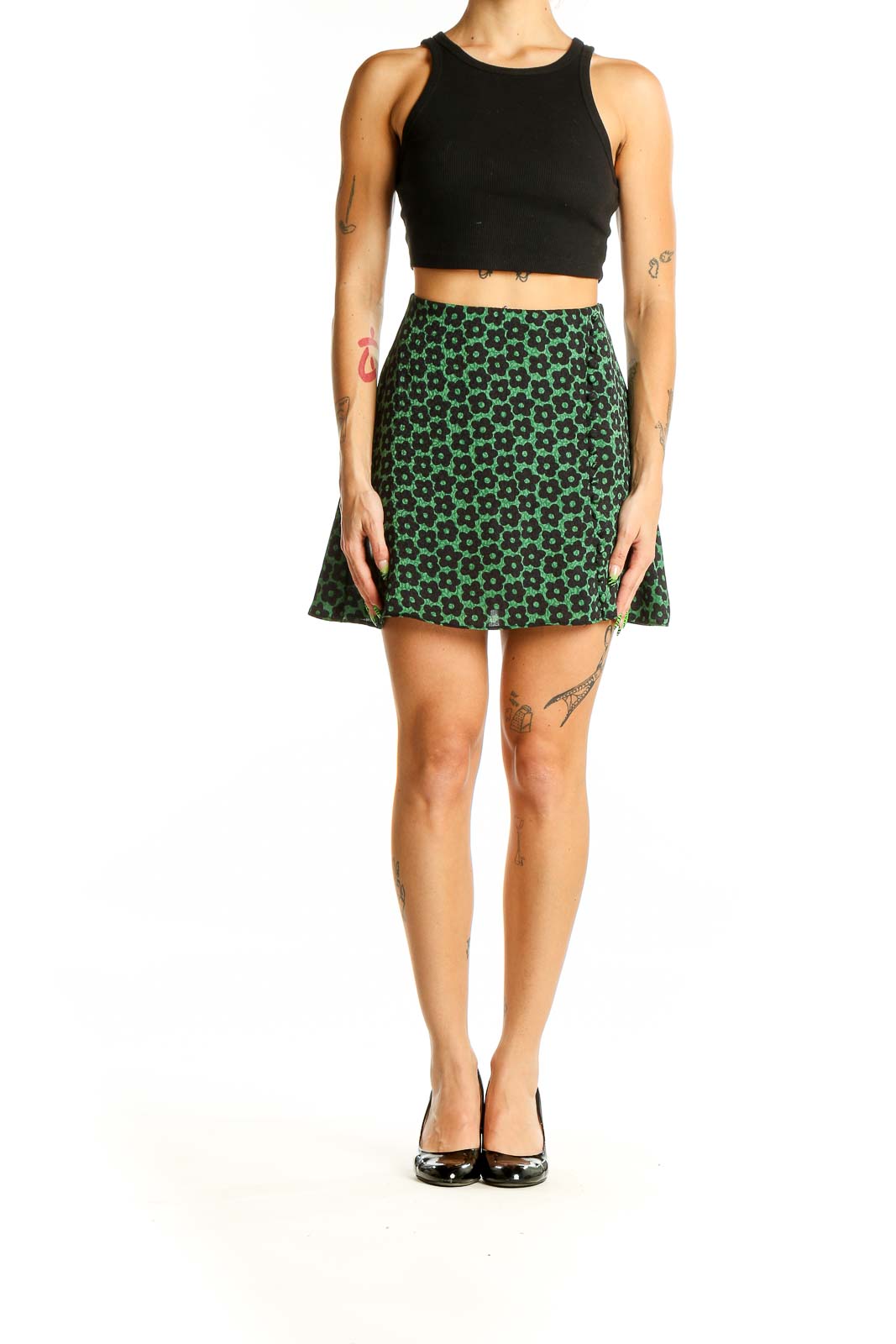 Front view of Urban Outfitters green floral print mini skirt