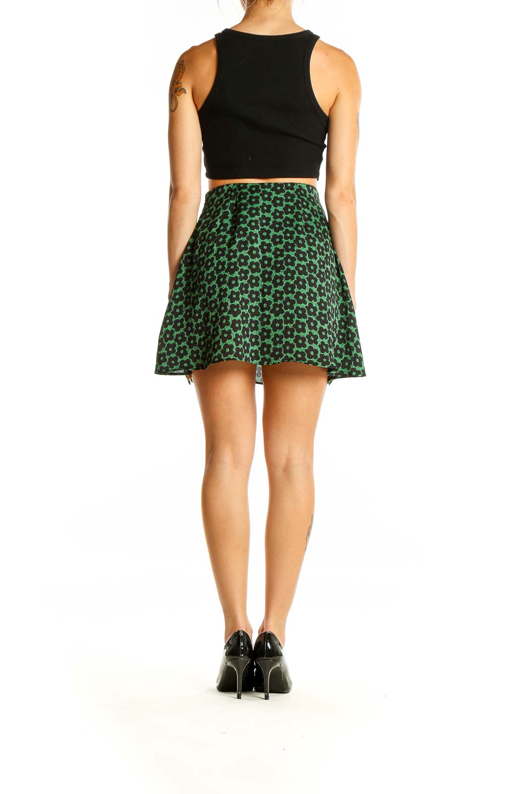 Back view of Urban Outfitters green floral print mini skirt with black crop top