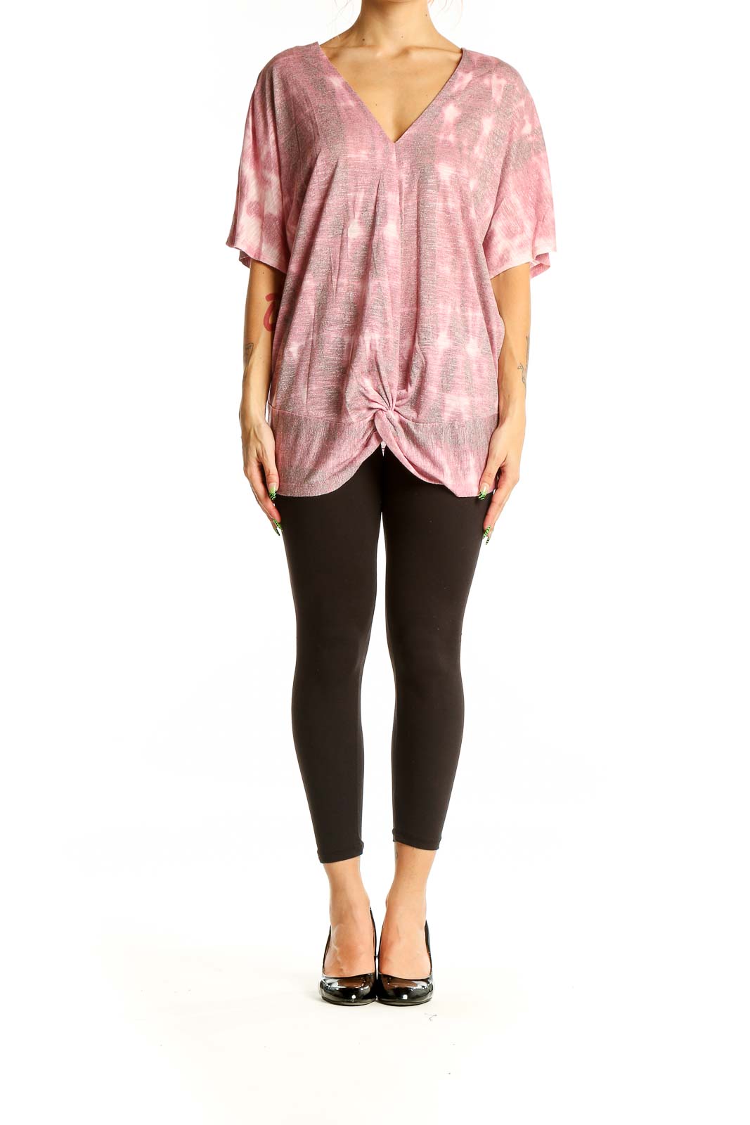 Front view of pink tie-dye V-neck oversized top with knotted hem