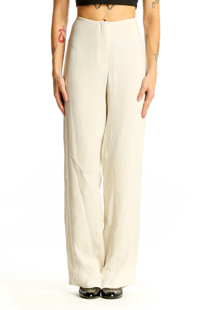 Front view of Eileen Fisher cream wide-leg flowy pants