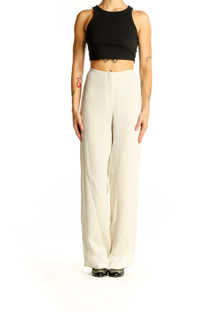 Front view of Eileen Fisher cream wide-leg flowy pants