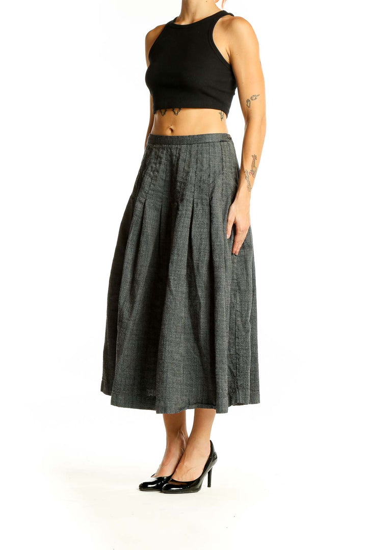 Front view of gray pleated midi skirt by SilkRoll