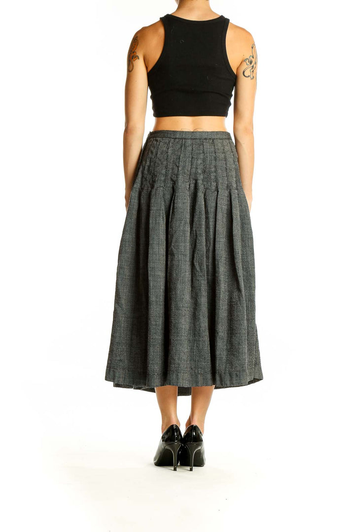 Back view of gray pleated midi skirt by SilkRoll