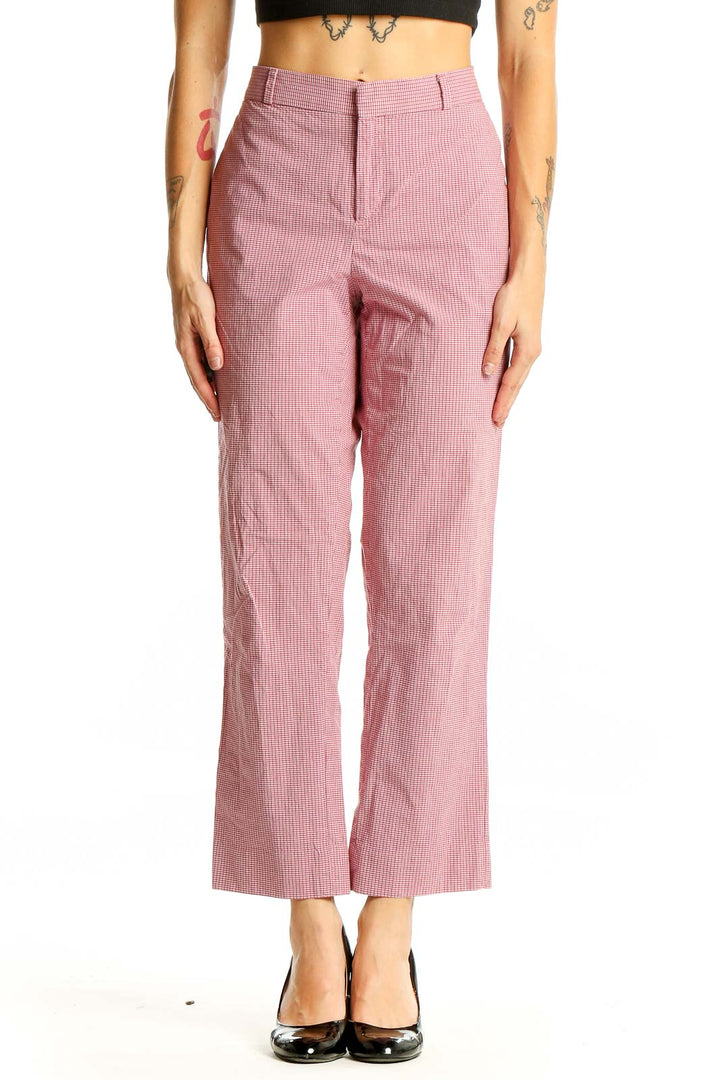 Front view of Avery pink striped cropped pants on model