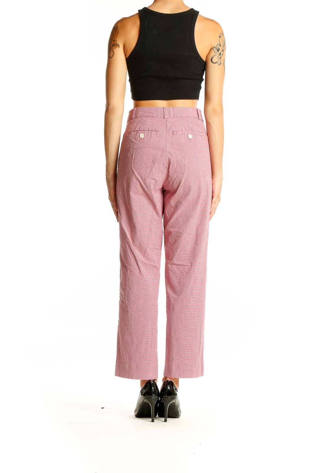 Back view of Avery pink striped cropped pants on model