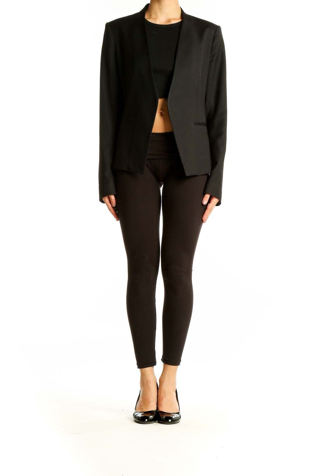 Front view of black Theory open-front blazer on model