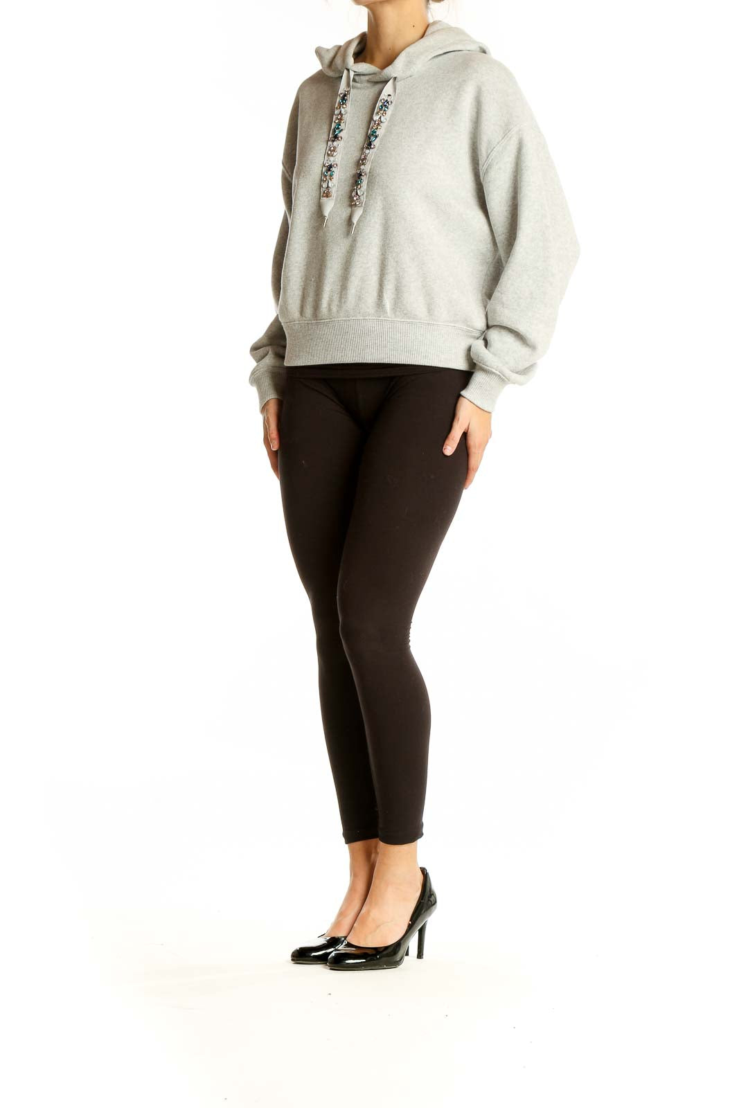 Front view of light gray Express cropped hoodie with embellished drawstrings