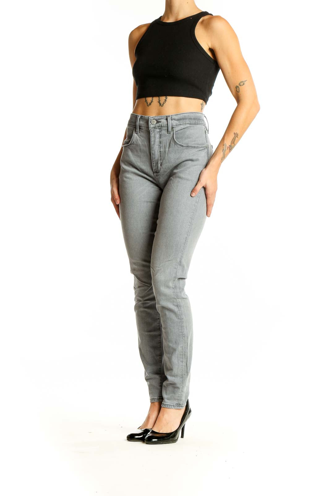 Front view of LOFT gray high-waisted skinny jeans on model