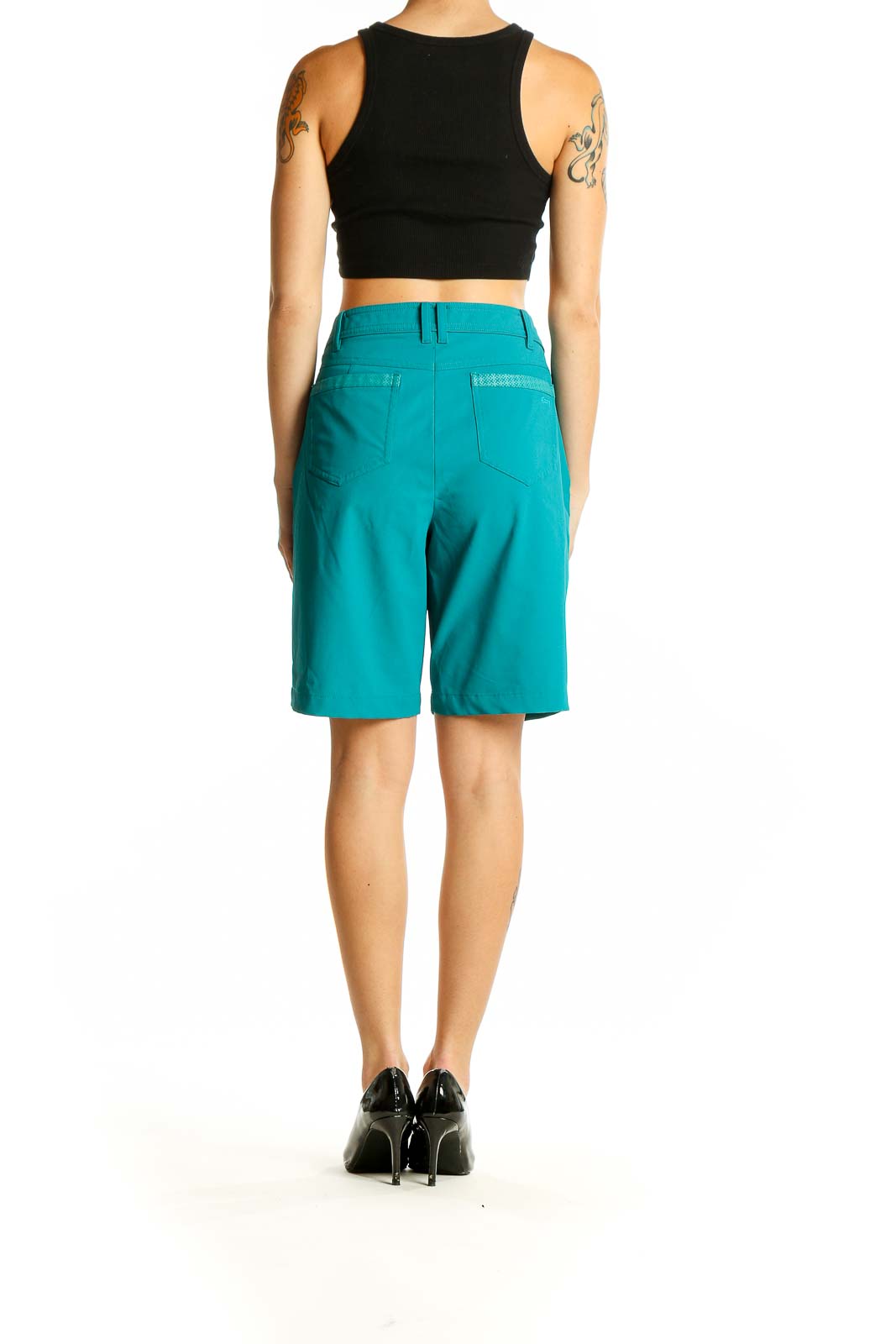 Side view of teal Louis Castel Bermuda activewear shorts on model