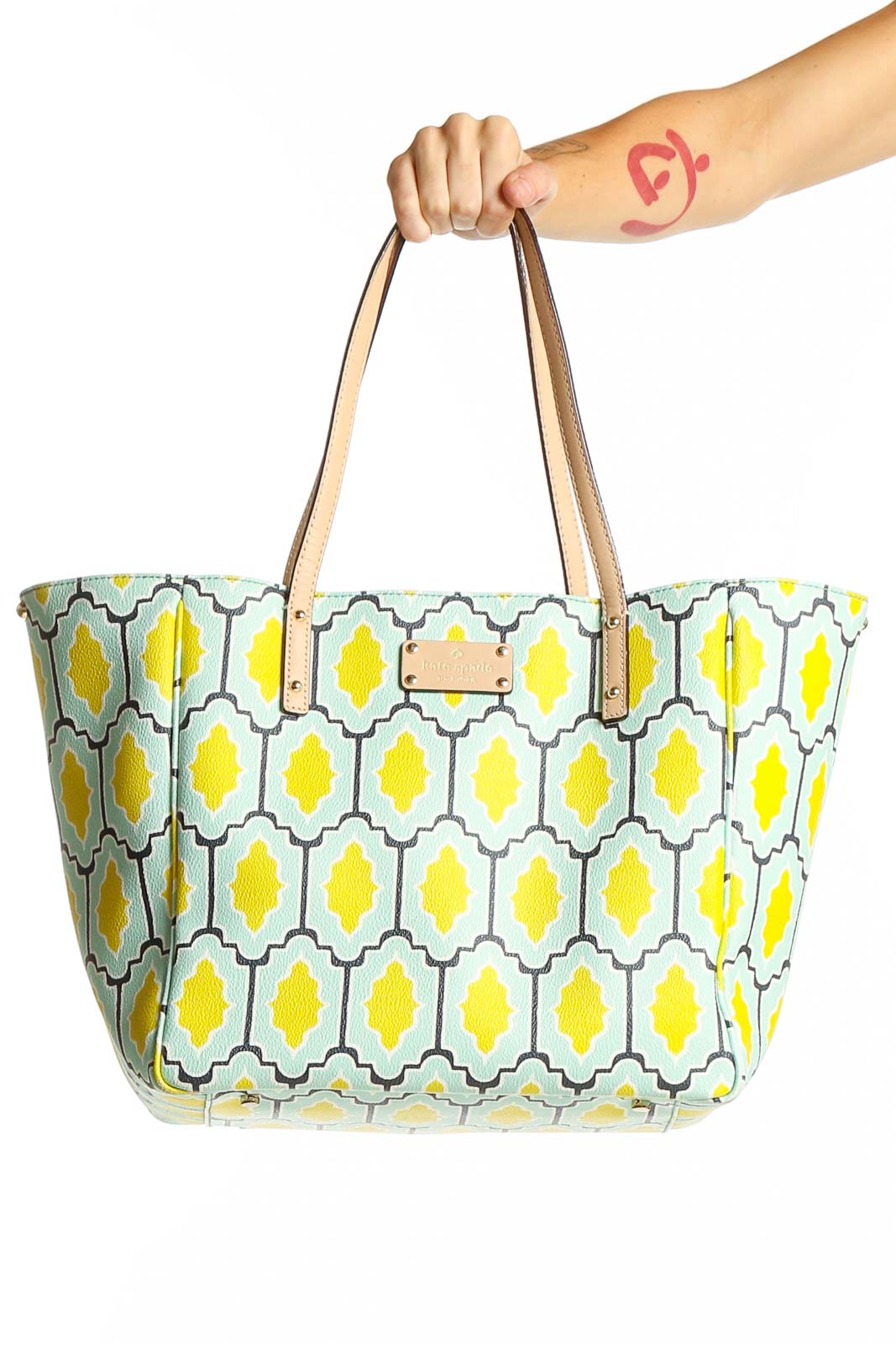 Front view of Kate Spade yellow and mint geometric print tote bag