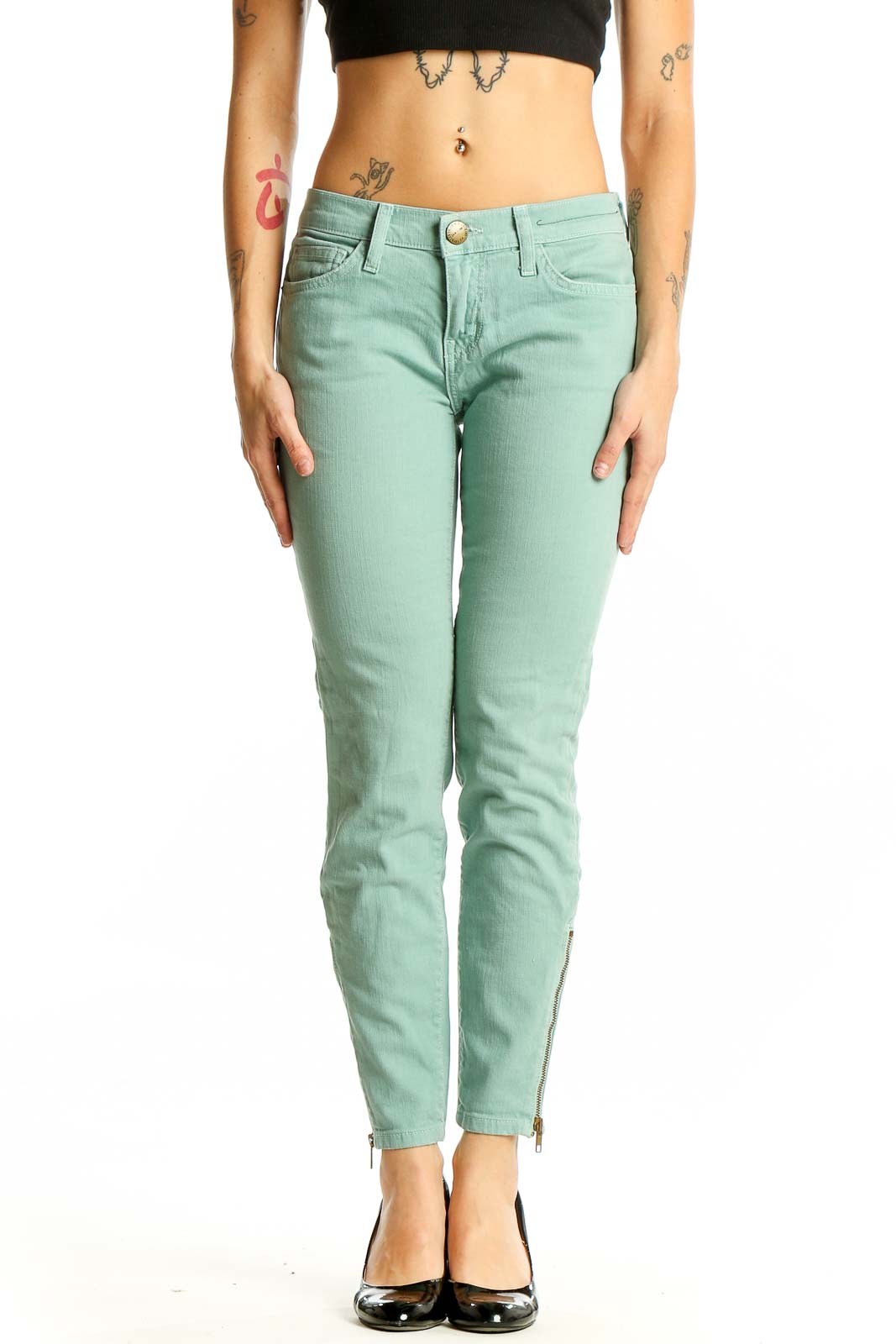 Front view of Current/Elliott mint green skinny ankle jeans with zipper detail