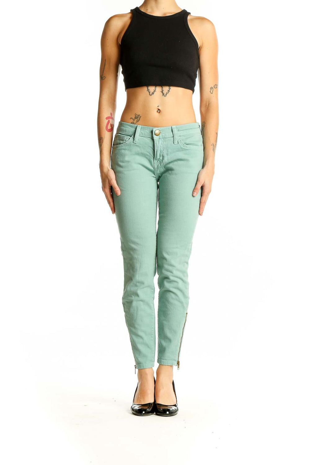 Front view of Current/Elliott mint green skinny ankle jeans with zipper detail