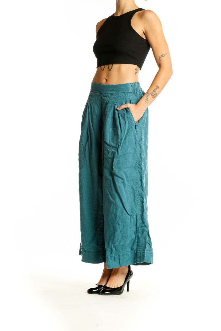 Front view of teal linen wide-leg cropped pants from Athleta