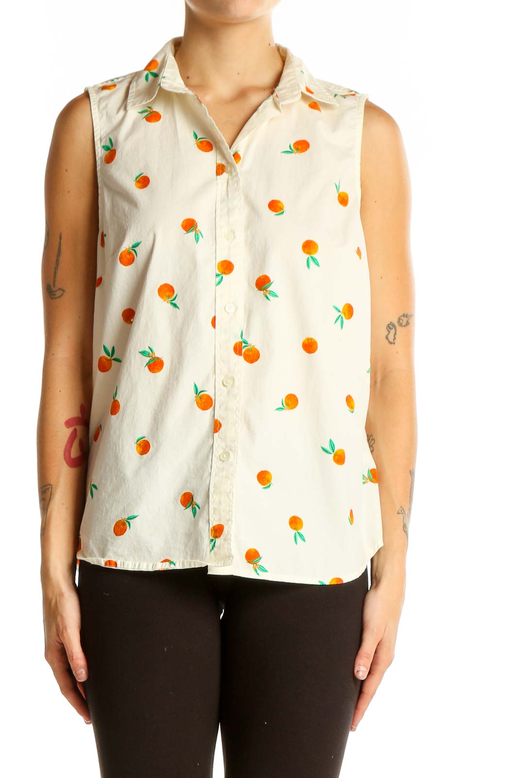 Front view of J.Crew white sleeveless button-up shirt with orange fruit print