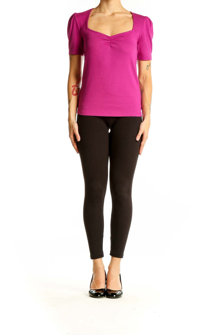 Front view of magenta LOFT top with puff sleeves and sweetheart neckline