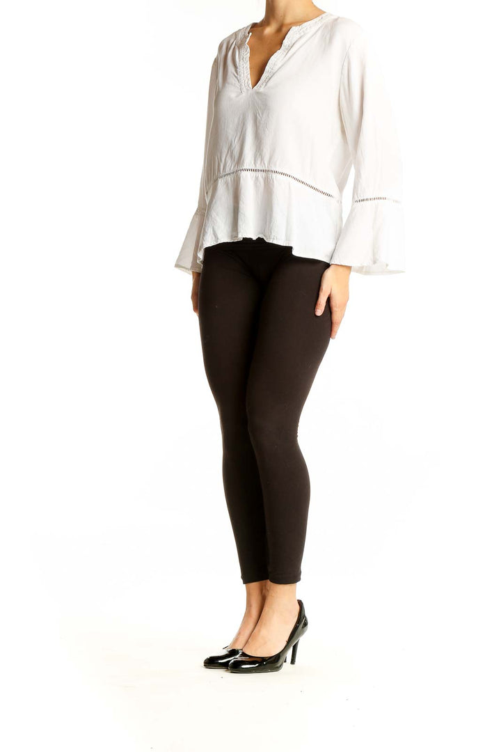 Front view of white Tencel Lyocell V-neck blouse with bell sleeves by cloth & stone