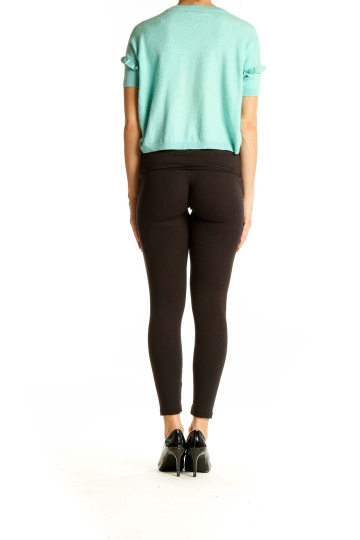 Back view of mint Rebecca Taylor cropped sweater showing ruffle sleeve detail